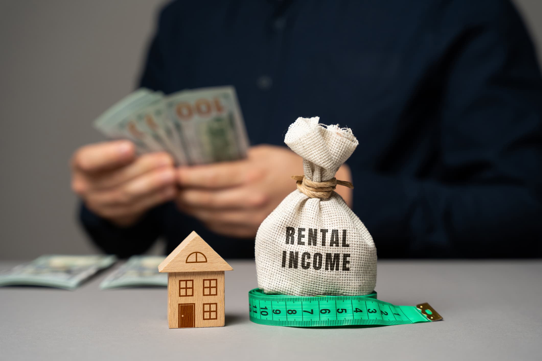 A person counting rental income