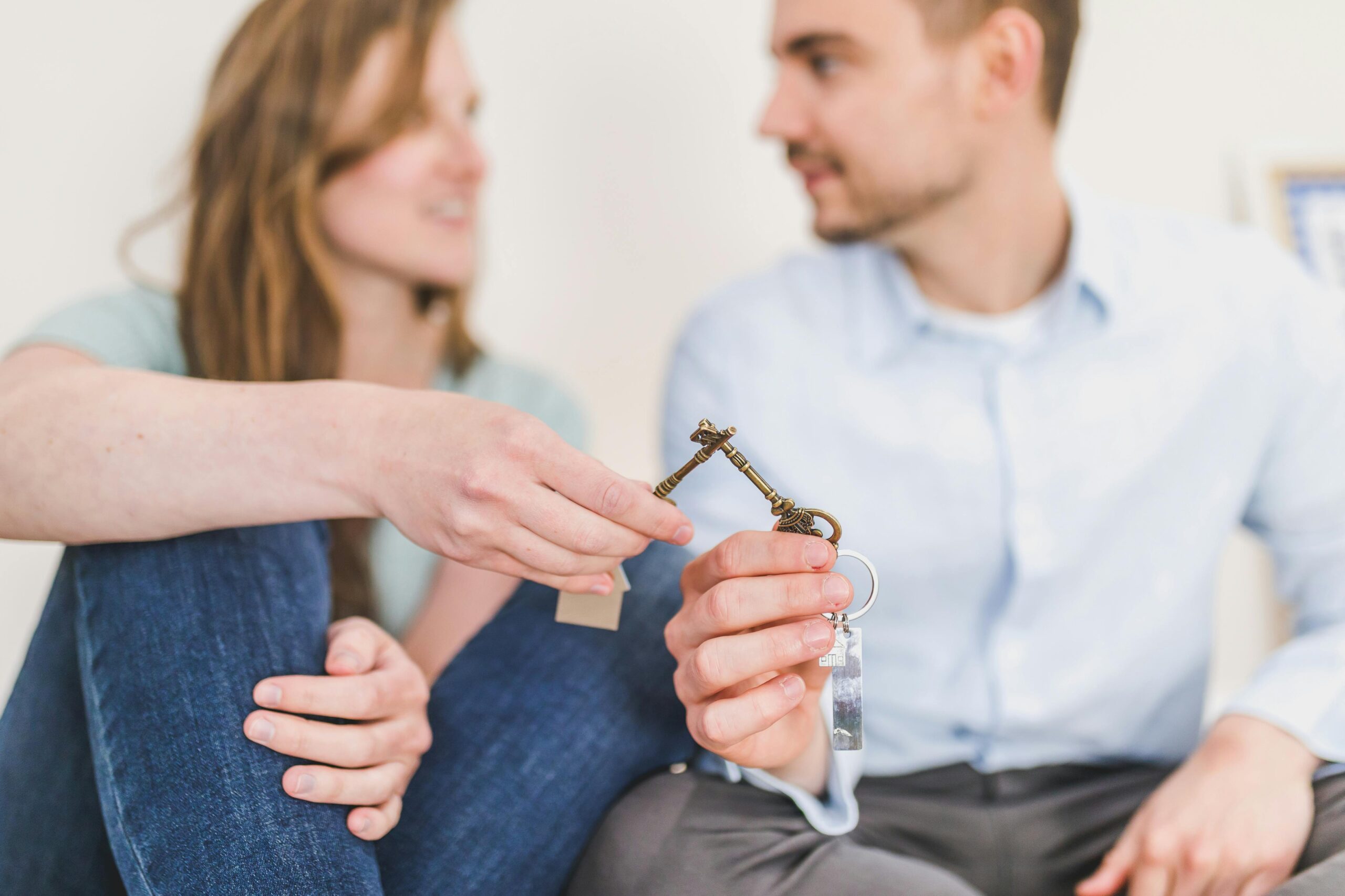 A couple holding a key after a home appraisal