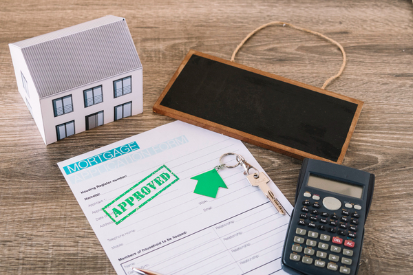 A calculator and a document for mortgage