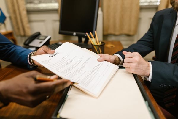 Man receiving divorce papers.