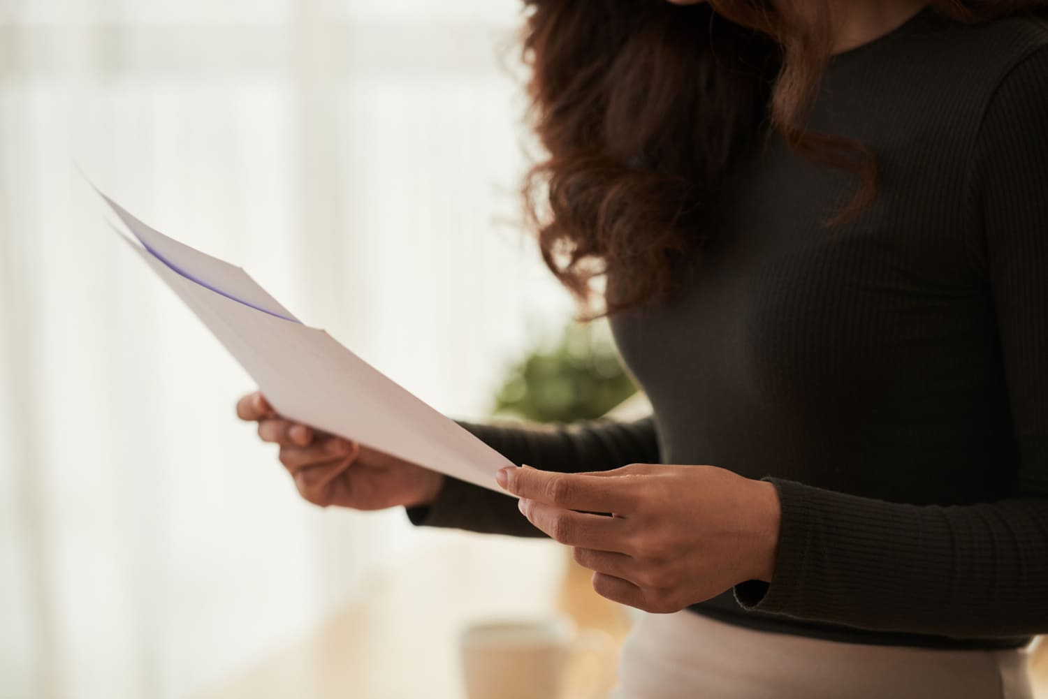 Woman checking business documents
