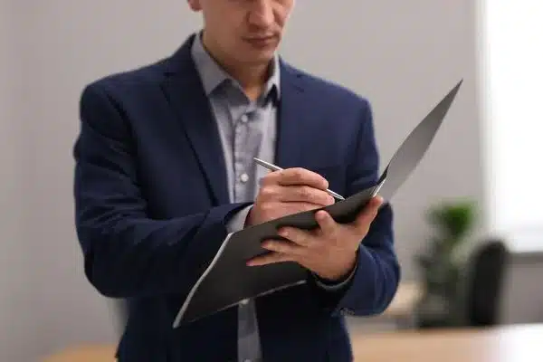 Appraiser inspecting home for valuation