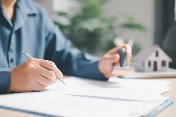 Property appraiser completing appraisal report